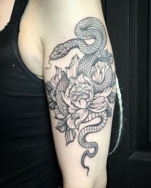 Fine Line Snake and Flowers Tattoo done at Hammersmith Tattoo London