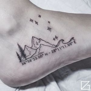 Fine Line Coordinates and Mountain Tattoo done at Hammersmith Tattoo London