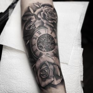 Black and Grey Realism Clock and Roses Tattoo done at Hammersmith Tattoo London