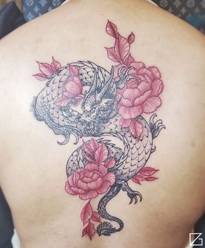 Fine Line Dragon and Flowers Tattoo done at Hammersmith Tattoo London
