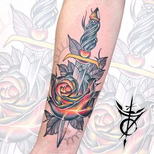 Fire Rose and Dagger Neo Traditional Tattoo done at Hammersmith Tattoo London