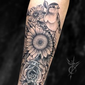 Robin and Sunflower Neo Traditional Tattoo done at Hammersmith Tattoo London