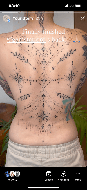 Get a stunning hand-poke pattern tattoo on your back by Indigo Forever Tattoos. Let intricate designs create a unique statement for you.