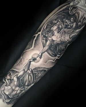 The Creation of Adam Black & Grey Realism Tattoo done at Hammersmith Tattoo London