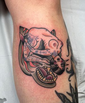 Panther and naked pinup girl Traditional Tattoo done at Hammersmith Tattoo London