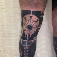 Geometric Blackwork Leg Tattoo