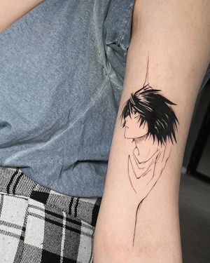 Capture the essence of anime with this blackwork forearm tattoo of a man, designed by the talented Artemis.