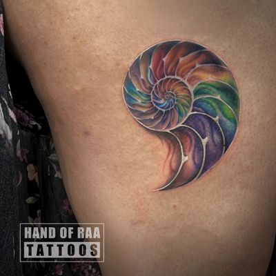 Pride inspired shell custom tattoo inspired by client.