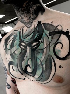 Transform your chest into an artistic canvas with this mesmerizing surreal blackwork pattern tattoo by the talented artist Artemis.