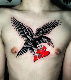 Experience the power of a blackwork tattoo featuring an eagle and heart motif by tattoo artist Ryan Goodrum.