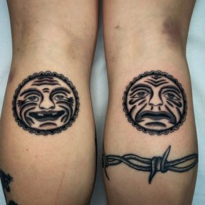 Get a striking black and gray fine line tattoo on your lower leg, featuring a sad smile and mask motif by the talented artist Ryan Goodrum.