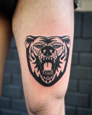 Get a striking blackwork bear tattoo by Adrimetric. Unique and bold design for all bear lovers.