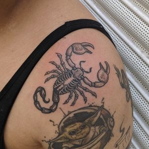 Get an intricate scorpion tattoo with a mix of blackwork, dotwork, and illustrative style by the talented artists at Alien Ink. Stand out with this unique design.