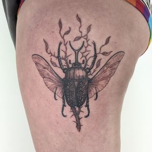 Unique blackwork and dotwork hand-poke tattoo of a stunning stagbeetle design by the talented artist at Alien Ink.