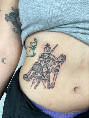 A black and gray fine line tattoo of two soldiers on the stomach, done by Jack Henry Tattoo.