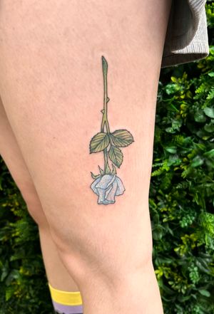 Embrace the beauty of nature with this colorful new school flower tattoo by Rachel Angharad.