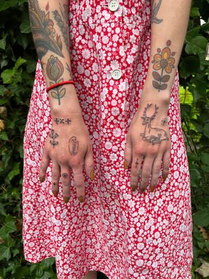 Elegant deer and pattern design by Jack Henry Tattoo, perfect for the hand placement.