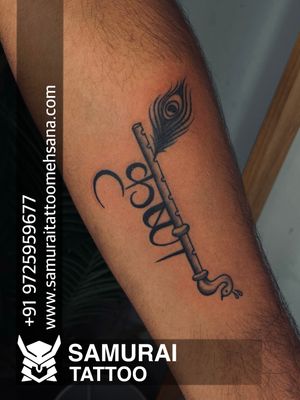 Flute with feather tattoo |Flute tattoo |Feather tattoo |Krishna tattoo