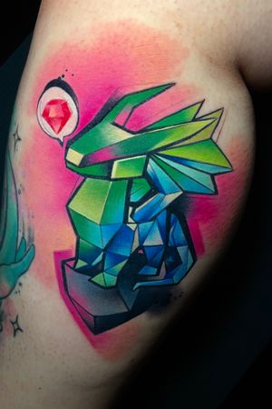Discover the mystical charm of a dragon in vibrant watercolor style on your upper arm by Cloto.tattoos.