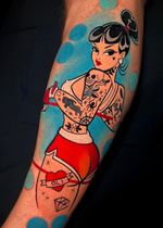 Vibrant new school style tattoo of a boxing girl on lower leg by Cloto.tattoos. Show your strength and femininity with this unique design.