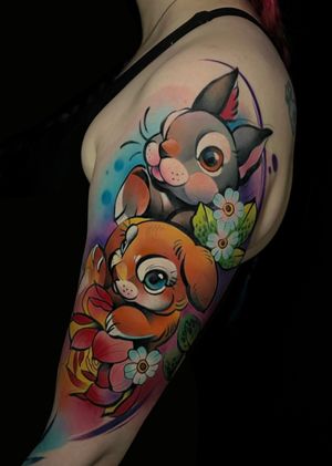 Get inked with a playful new school rabbit design by Cloto.tattoos on your upper arm. Vibrant watercolor style adds a unique touch.