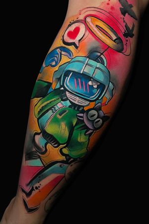 Colorful new school tattoo on lower leg featuring a cat, heart, and space man by Cloto.tattoos
