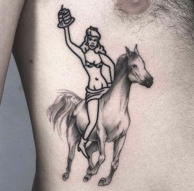 Pin up girl on fine line horse 