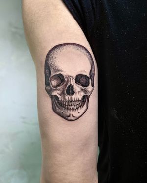 Unlock the mysteries of life and death with this detailed skull tattoo by Andrew Garinther. Made with striking dotwork and illustrative style.