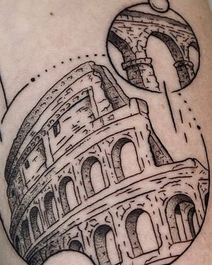 Capture the majesty of ancient architecture with this bold and detailed blackwork tattoo of the iconic Colosseum. Rendered in an illustrative style by the talented artist Andrew Garinther.