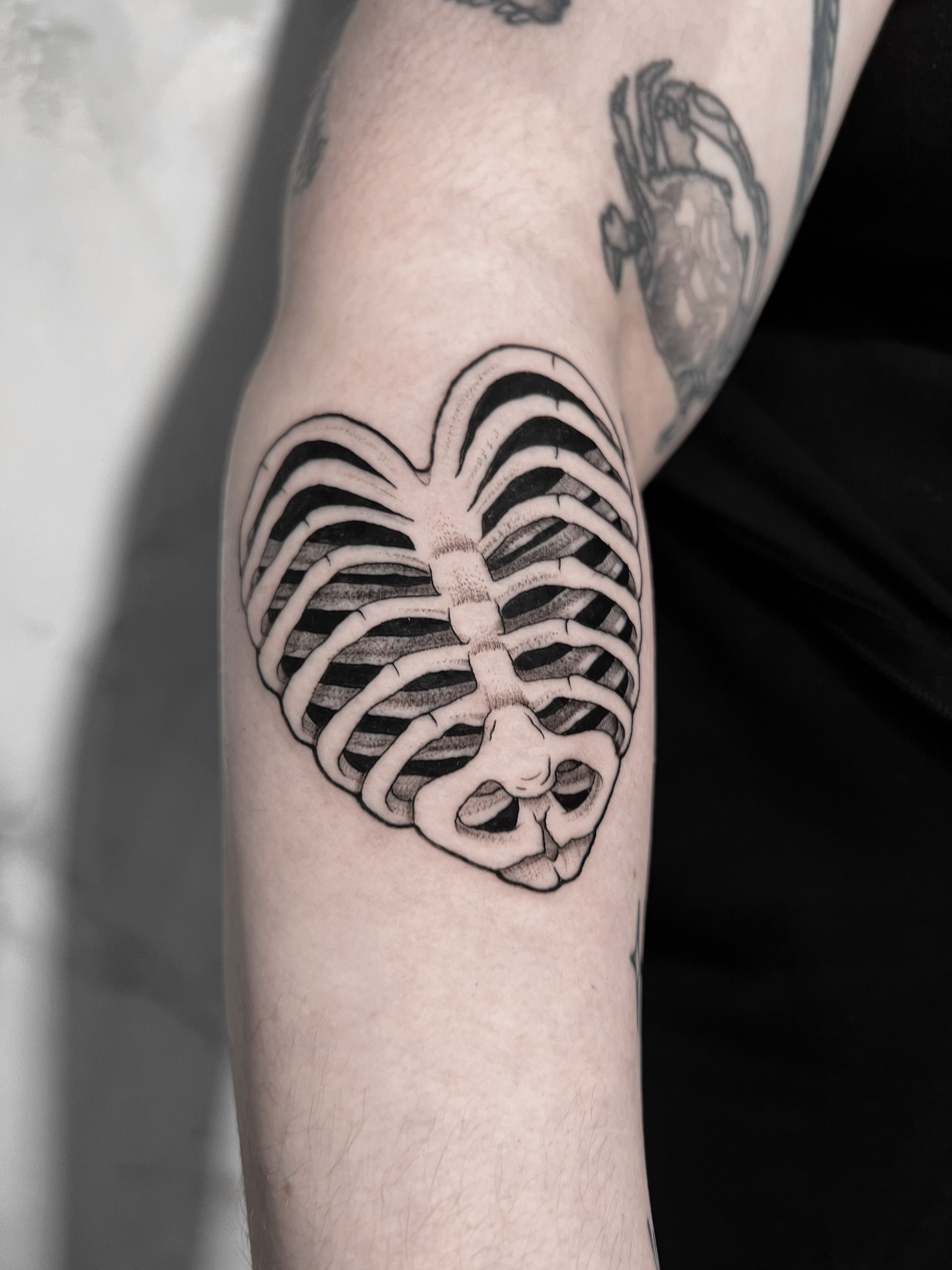 Heart Tattoo on Rib Cage - Bold & Beautiful