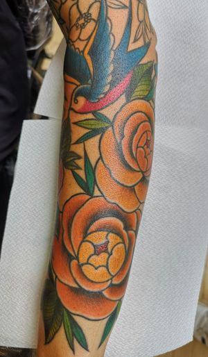Traditional swallow and roses