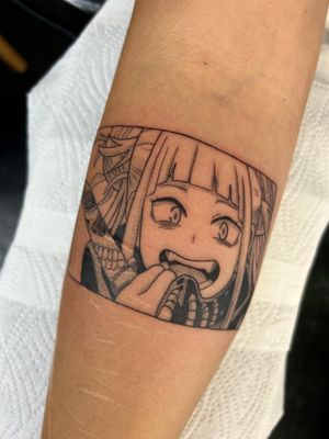 Get a stunning anime girl tattoo on your forearm by Jack Howard, showcasing intricate details and vibrant colors.