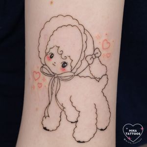 Adorable anime style sheep tattoo with fine line details, created by talented artist Mika. Perfect for lovers of cute and kawaii designs.