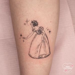 Get the magic of Disney with this fine line black and gray tattoo of Snow White by Mika Tattoos. Perfect for fans of classic cartoons!