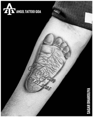Baby Footprint Tattoo By Sagar Dharoliya At Angel Tattoo Goa - Best Tattoo Artist in Goa - Best Tattoo Studio in Goa #angeltattoogoa #besttattooartistingoa #besttattoostudioingoa #tattooingoa #sagardharoliya