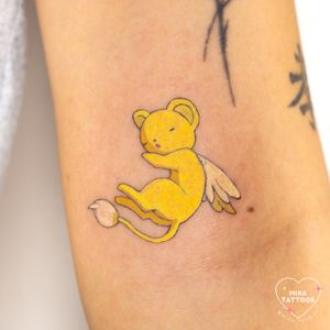 Adorable anime design featuring Kero from Card Captor Sakura, by Mika Tattoos. Cute and colorful!