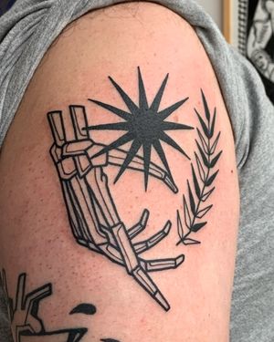 Adrimetric's blackwork tattoo featuring a skeleton hand holding a black star and vine, in illustrative and ignorant style.