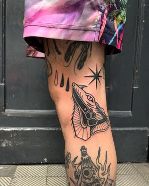 Adrimetric's detailed iguana tattoo showcases blackwork technique in an illustrative design.