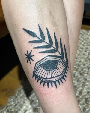 Unique blackwork tattoo featuring an abstract eye design, executed in illustrative style by Adrimetric.