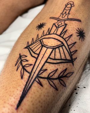 Adrimetric's blackwork illustration features a stunning combination of a dagger and eye motif, creating a captivating and mysterious design.
