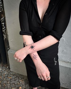 Adrimetric's blackwork star tattoo features a clean, illustrative style for a bold and striking look.