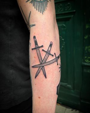 Impressive sword design in illustrative blackwork style by Adrimetric. Make a statement with this striking tattoo.