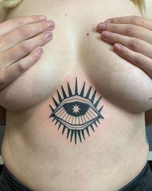 Adrimetric's blackwork illustration of an eye captures the essence of depth and perception in this intriguing tattoo design.