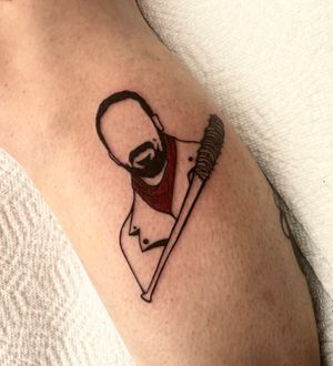 Show off your edgy side with a fine line tattoo of a man on your lower leg, skillfully done by Miss Vampira.