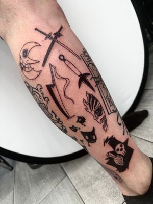 A stunning blackwork and fine line tattoo on the lower leg featuring a crescent moon and dagger, by the talented Miss Vampira.