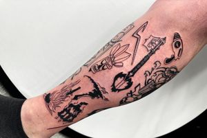 Fine line flames add dynamic to lower leg tattoo by Miss Vampira. Edgy and unique design.