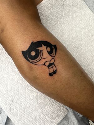 Get the best of both worlds with this fine line and new school style tattoo featuring the powerful Powerpuff Girls, by the talented Miss Vampira.