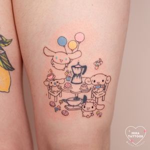 Adorable anime-style fine line tattoo featuring Cinnamoroll from Sanrio enjoying a cute tea party, by Mika Tattoos.