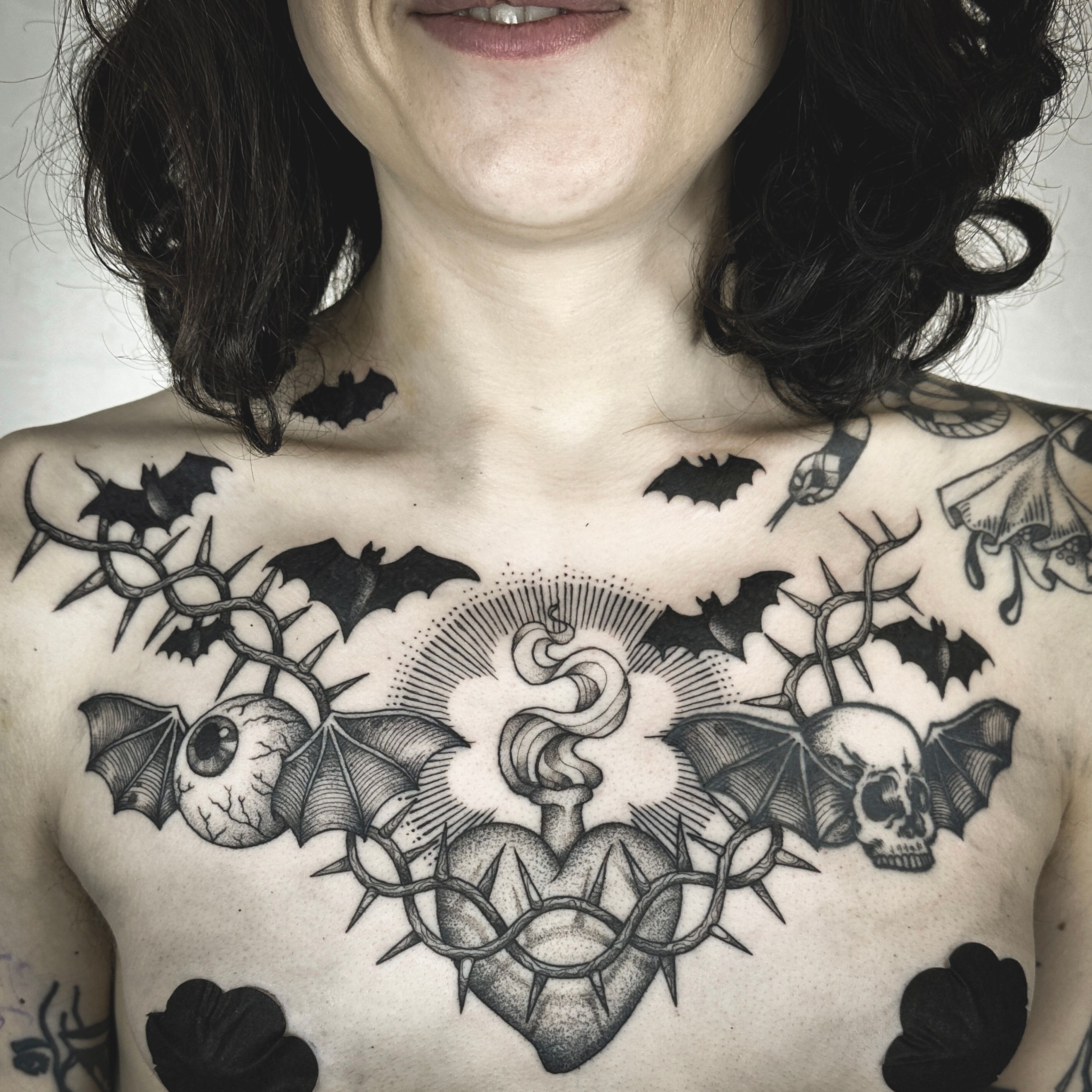 Flower Tattoos on the Chest: A Witchy Statement