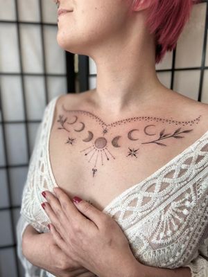 Elegant dotwork and fine line design by Viví Bogdanov featuring a detailed moon surrounded by intricate leaves.